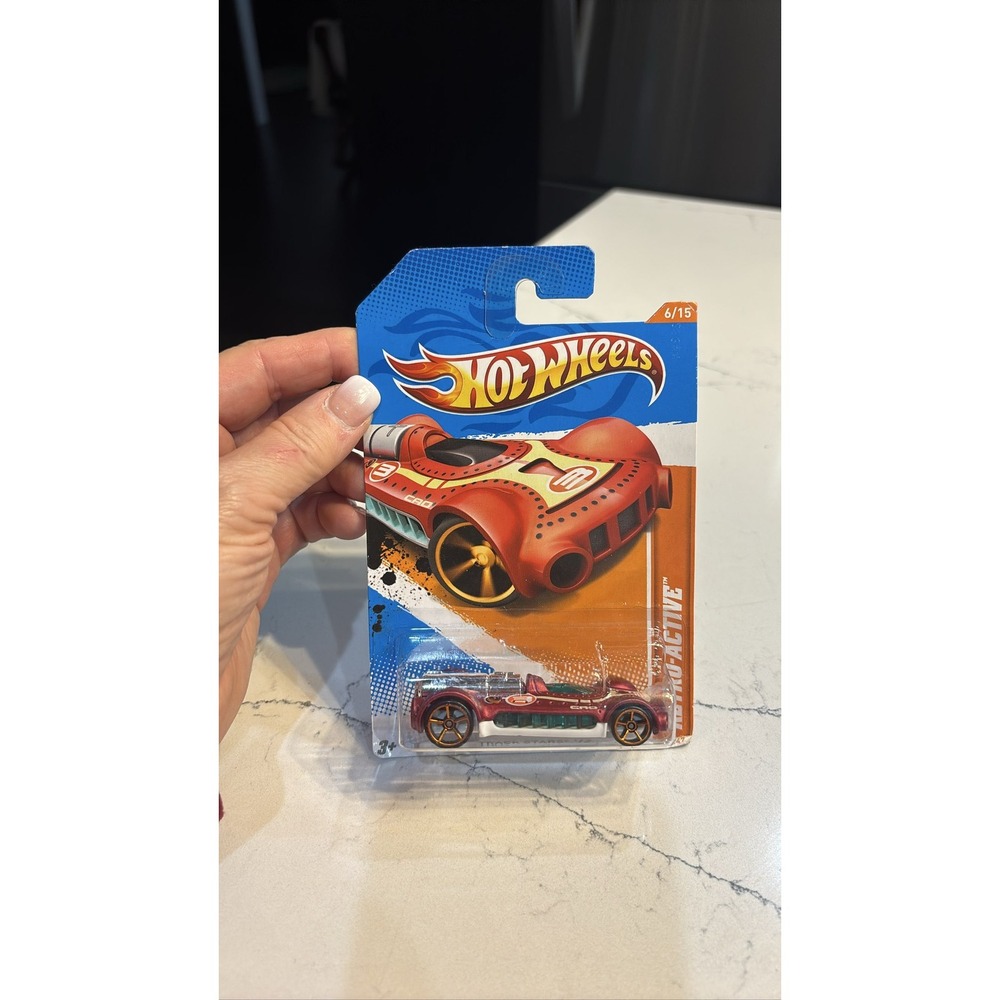 Hot Wheels 2012 Retro-Active Track Stars 6/15 Red Diecast Car